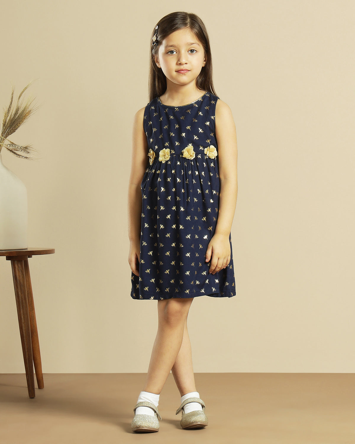 Navy blue girls long sleeve polka dot dress with contrast collar and flared hem