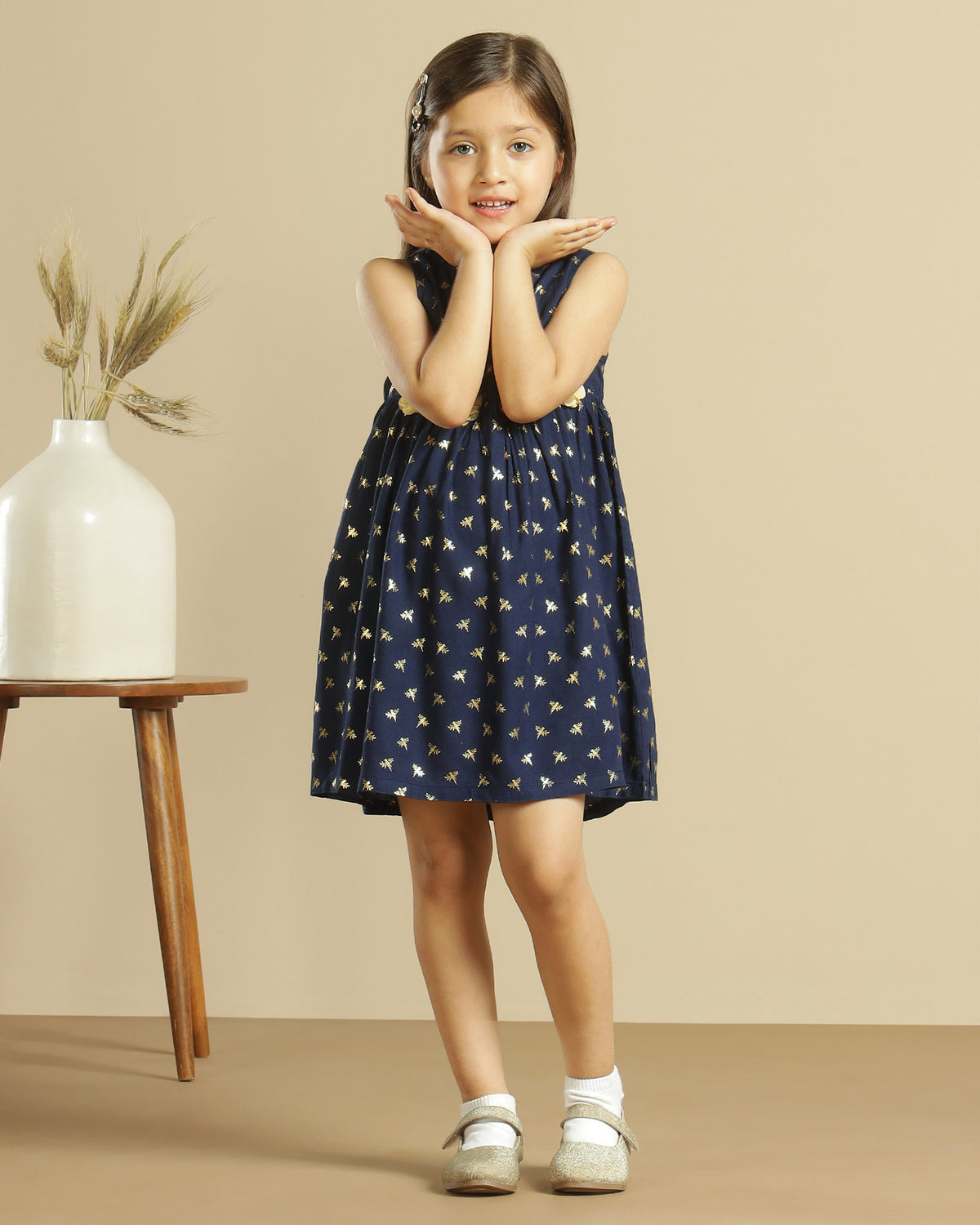 Navy blue girls long sleeve polka dot dress with contrast collar and flared hem