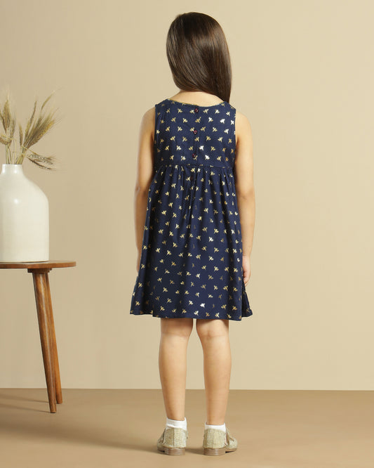 Navy blue girls long sleeve polka dot dress with contrast collar and flared hem