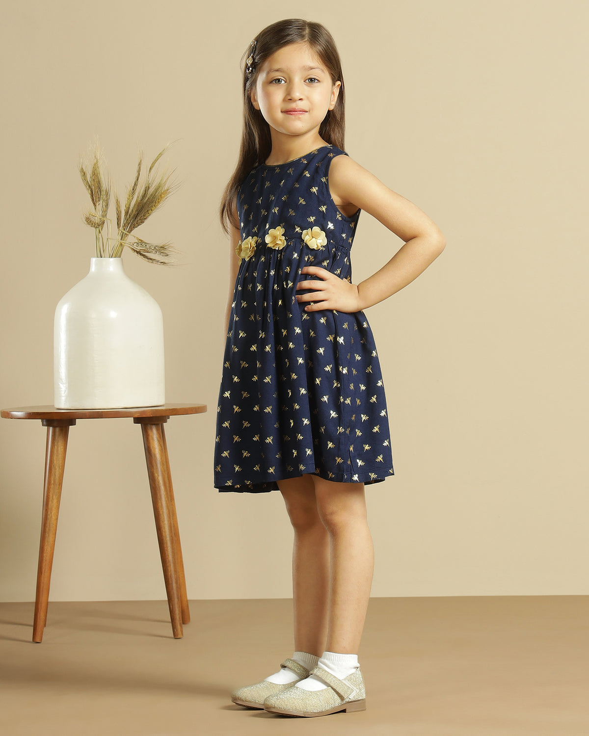 Navy blue girls long sleeve polka dot dress with contrast collar and flared hem