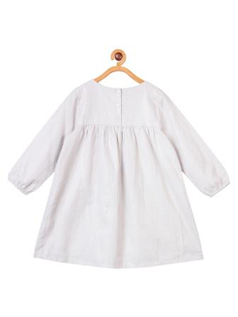 White girls long sleeve dress with colourful embroidered detailing and gathered waist