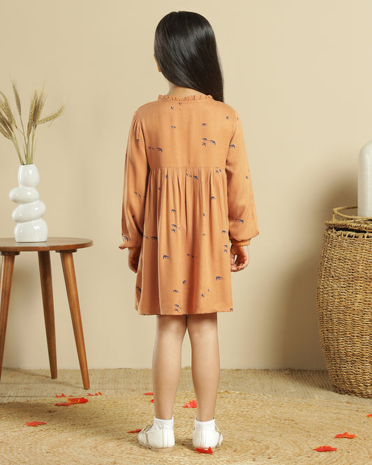 Mustard girls long sleeve dress with gathered waist, ruffle detailing and flared hem