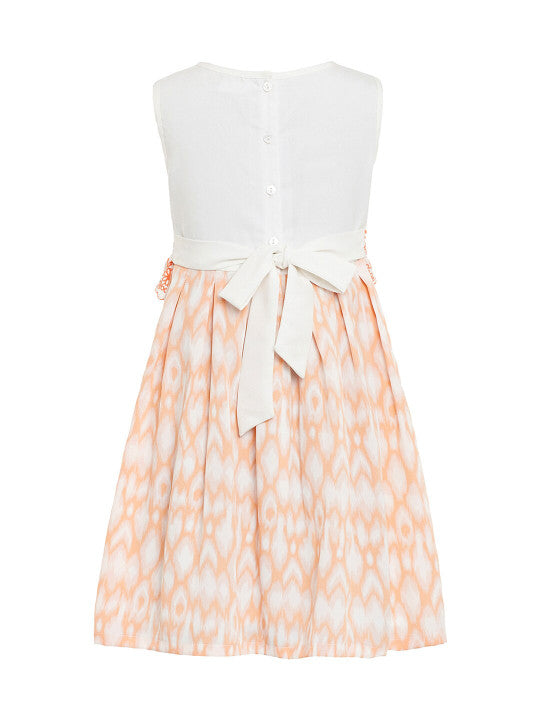 White and peach girls sleeveless dress with checked flared skirt and gathered waist