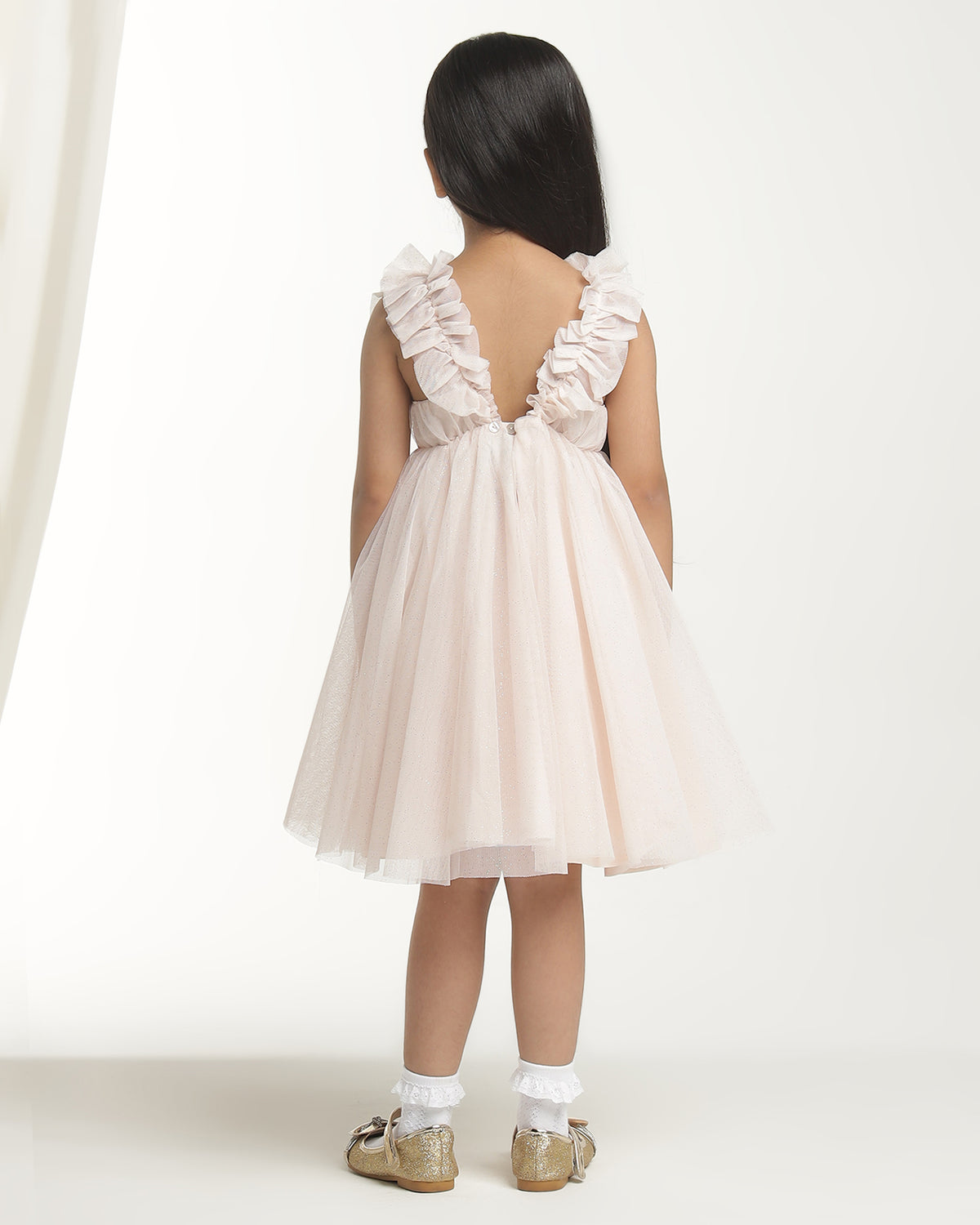 Blush pink girls sleeveless fit and flare dress with pleated skirt and flared hem