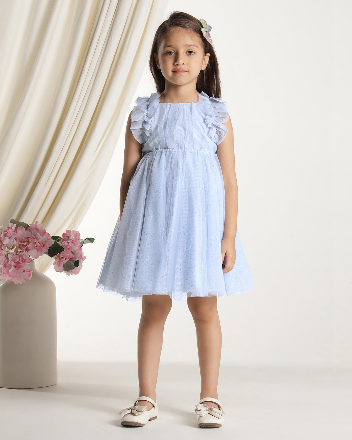 Light blue girls sleeveless fit and flare dress with pleated skirt and flared hem