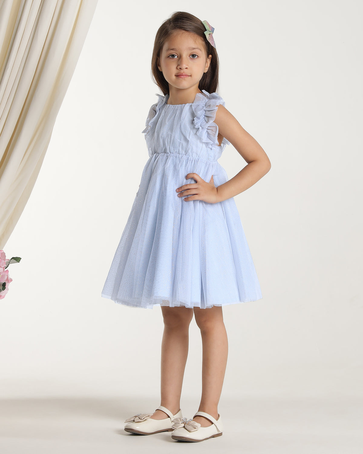 Light blue girls sleeveless fit and flare dress with pleated skirt and flared hem