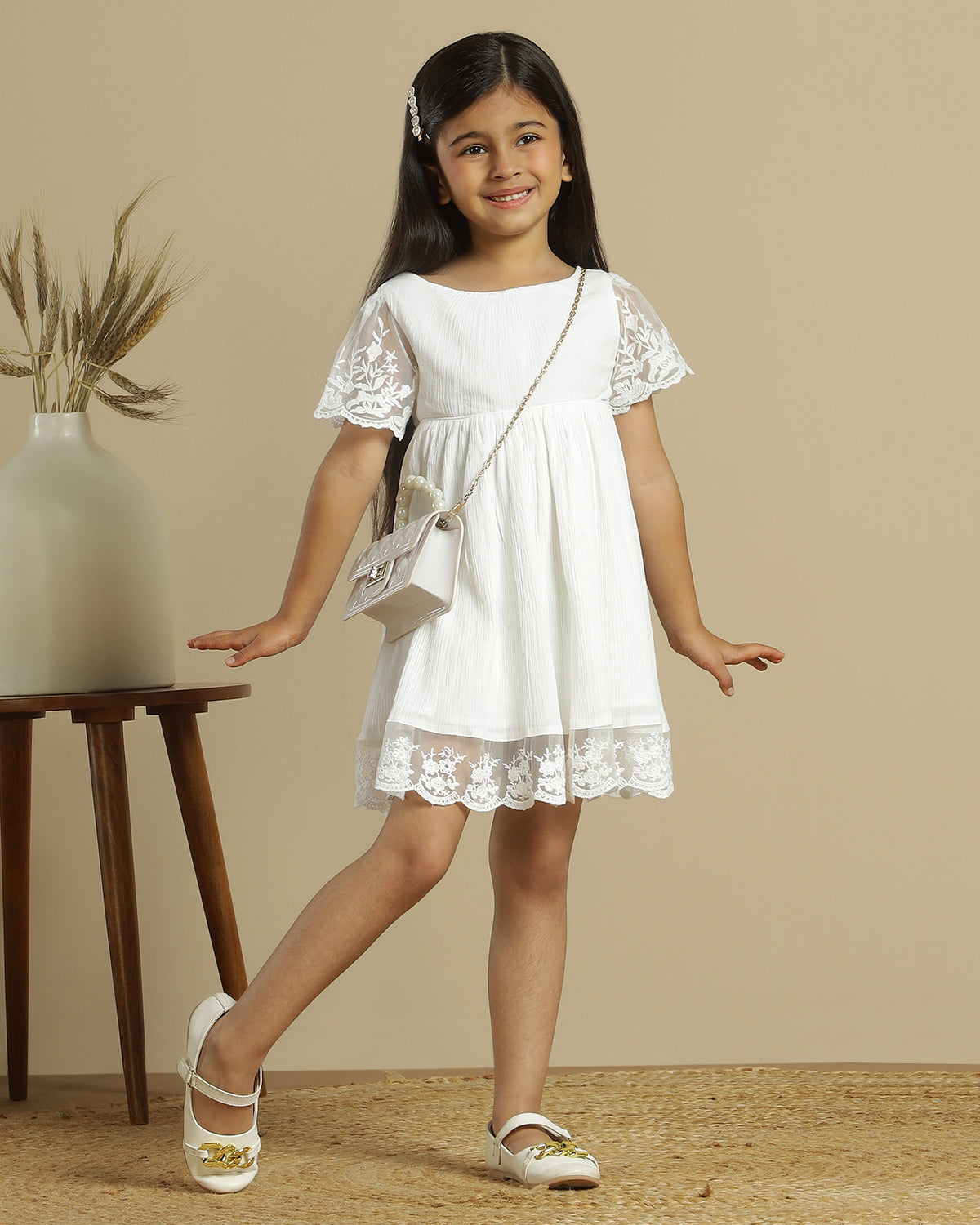 White girls short sleeve dress with ruffle detailing and tiered hem