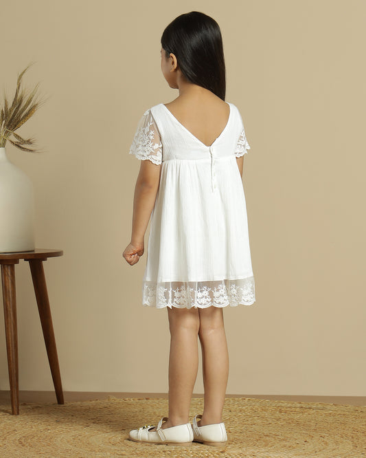 White girls short sleeve dress with ruffle detailing and tiered hem