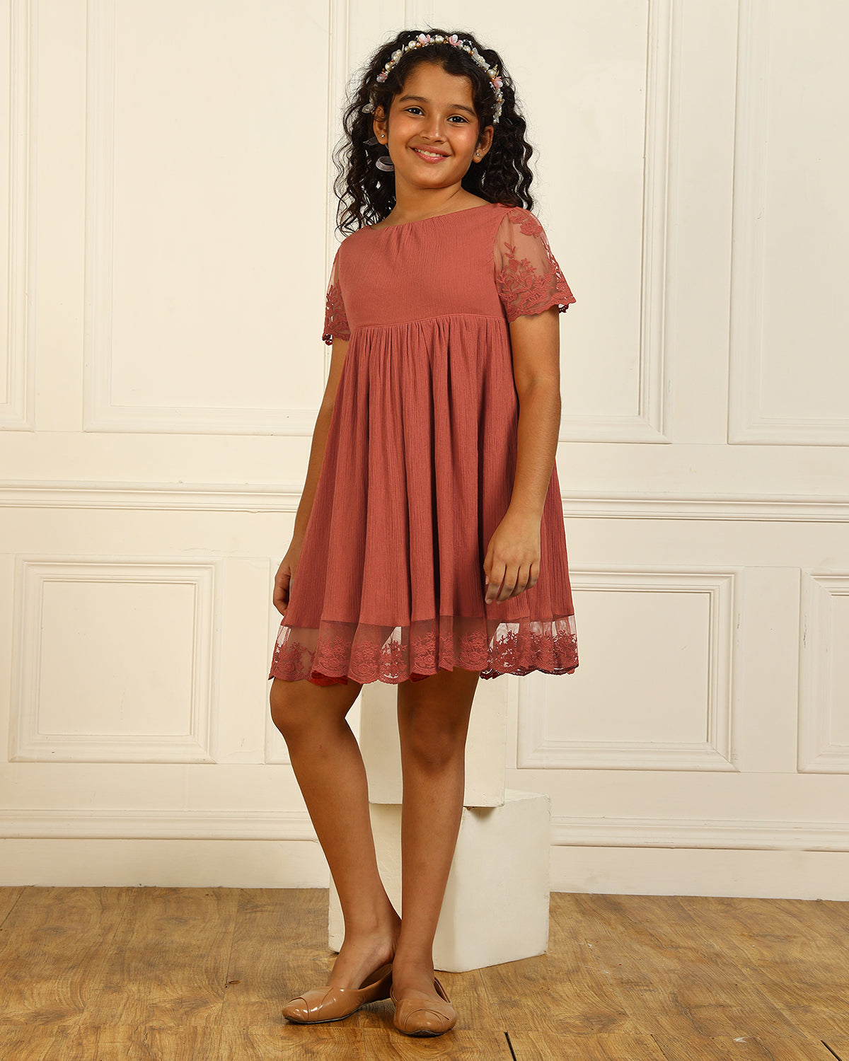 Rust orange girls short sleeve tiered dress with gathered waist and ruffle detailing