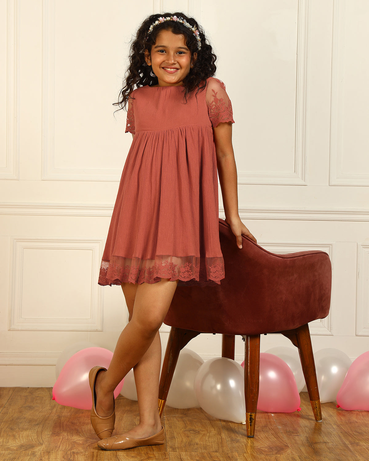 Rust orange girls short sleeve tiered dress with gathered waist and ruffle detailing