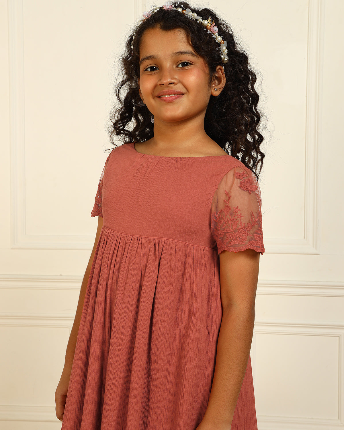 Rust orange girls short sleeve tiered dress with gathered waist and ruffle detailing