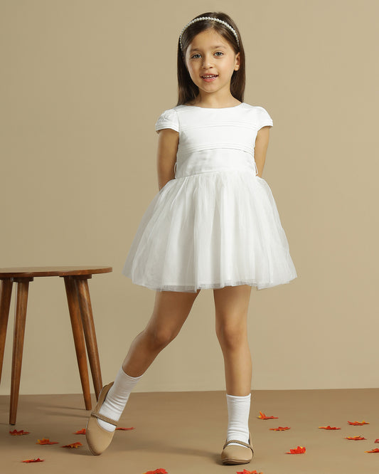 White girls sleeveless fit and flare dress with contrast hem and flared skirt