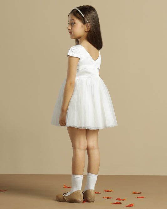White girls sleeveless fit and flare dress with contrast hem and flared skirt