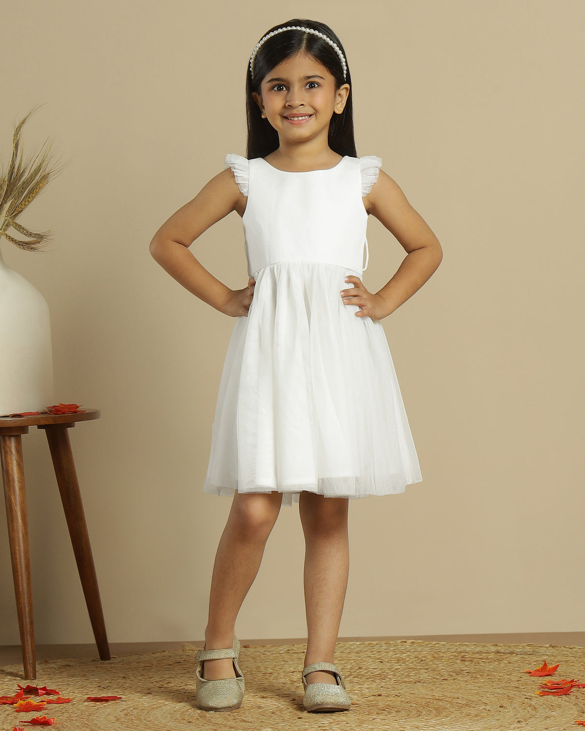 Blush pink girls layered tulle skirt with elasticated waist and flared hem