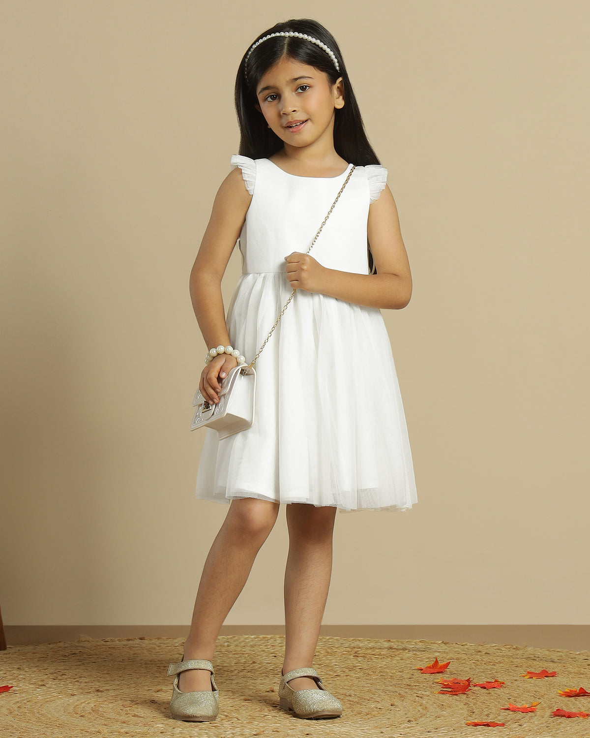 Blush pink girls layered tulle skirt with elasticated waist and flared hem