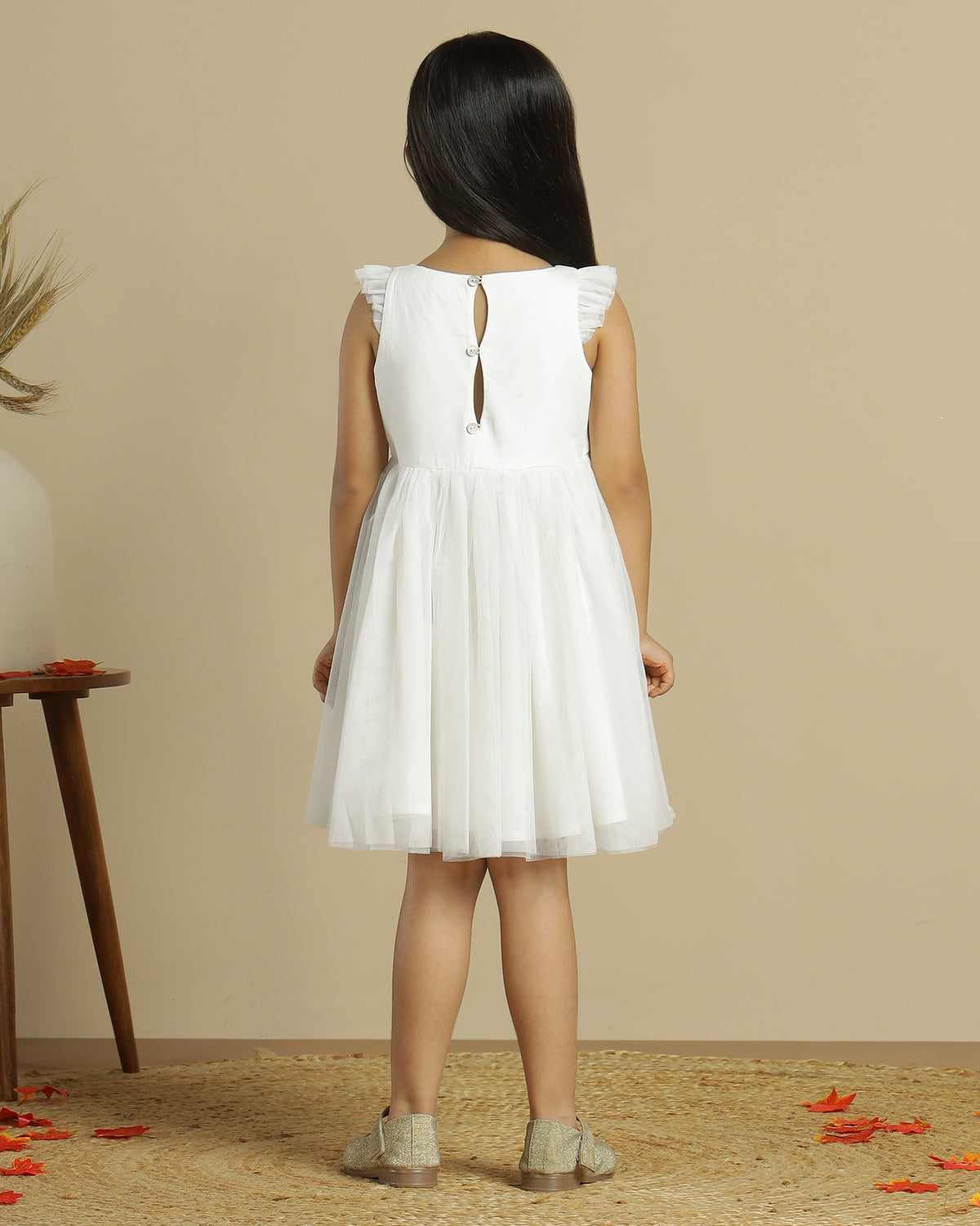 Blush pink girls layered tulle skirt with elasticated waist and flared hem