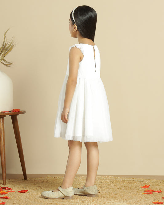 Blush pink girls layered tulle skirt with elasticated waist and flared hem