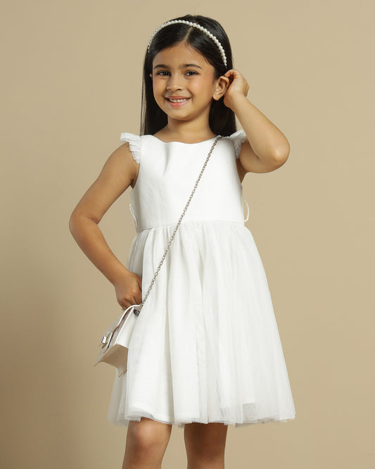 Blush pink girls layered tulle skirt with elasticated waist and flared hem