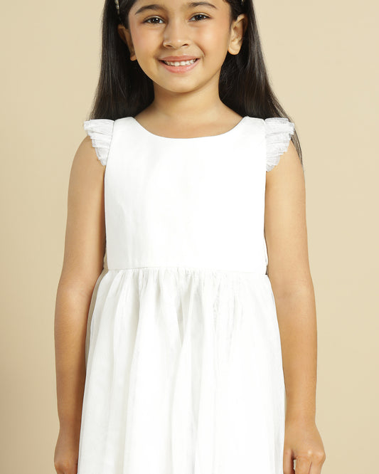 Blush pink girls layered tulle skirt with elasticated waist and flared hem