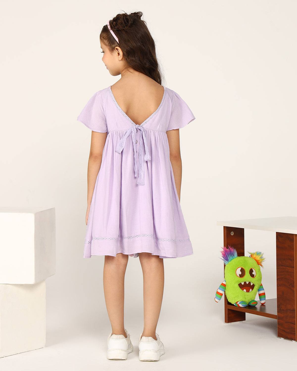 Lavender girls short sleeve dress with gathered waist and flared hem