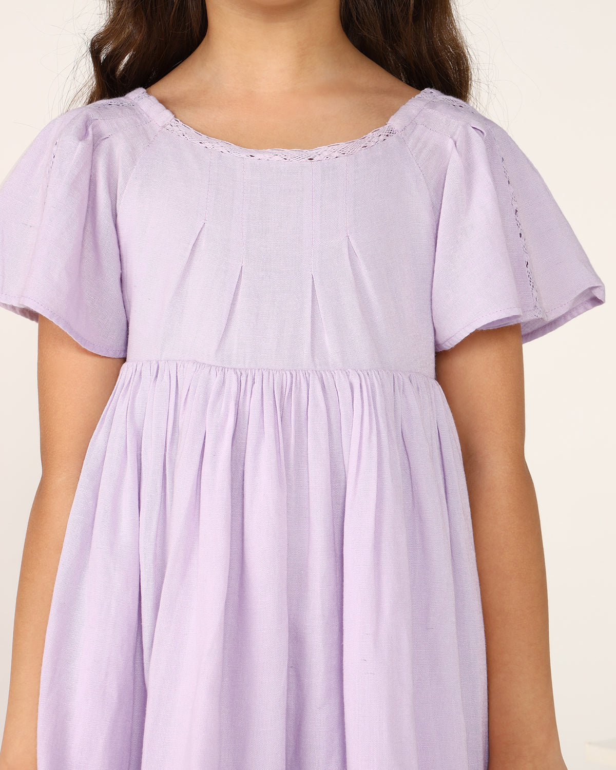 Lavender girls short sleeve dress with gathered waist and flared hem