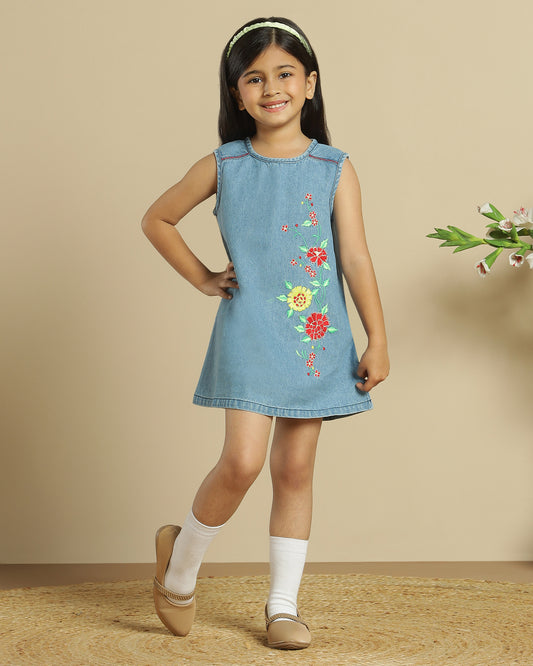 Blue denim girls sleeveless dress with colourful floral embroidery and front pocket detailing