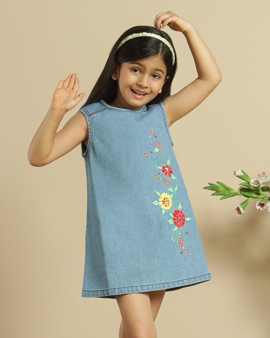 Blue denim girls sleeveless dress with colourful floral embroidery and front pocket detailing