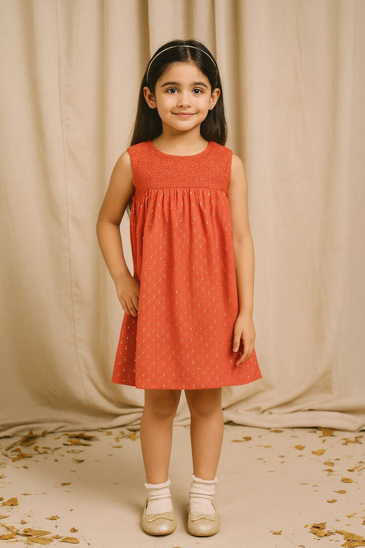 Coral girls sleeveless fit and flare dress with pleated detailing and flared hem