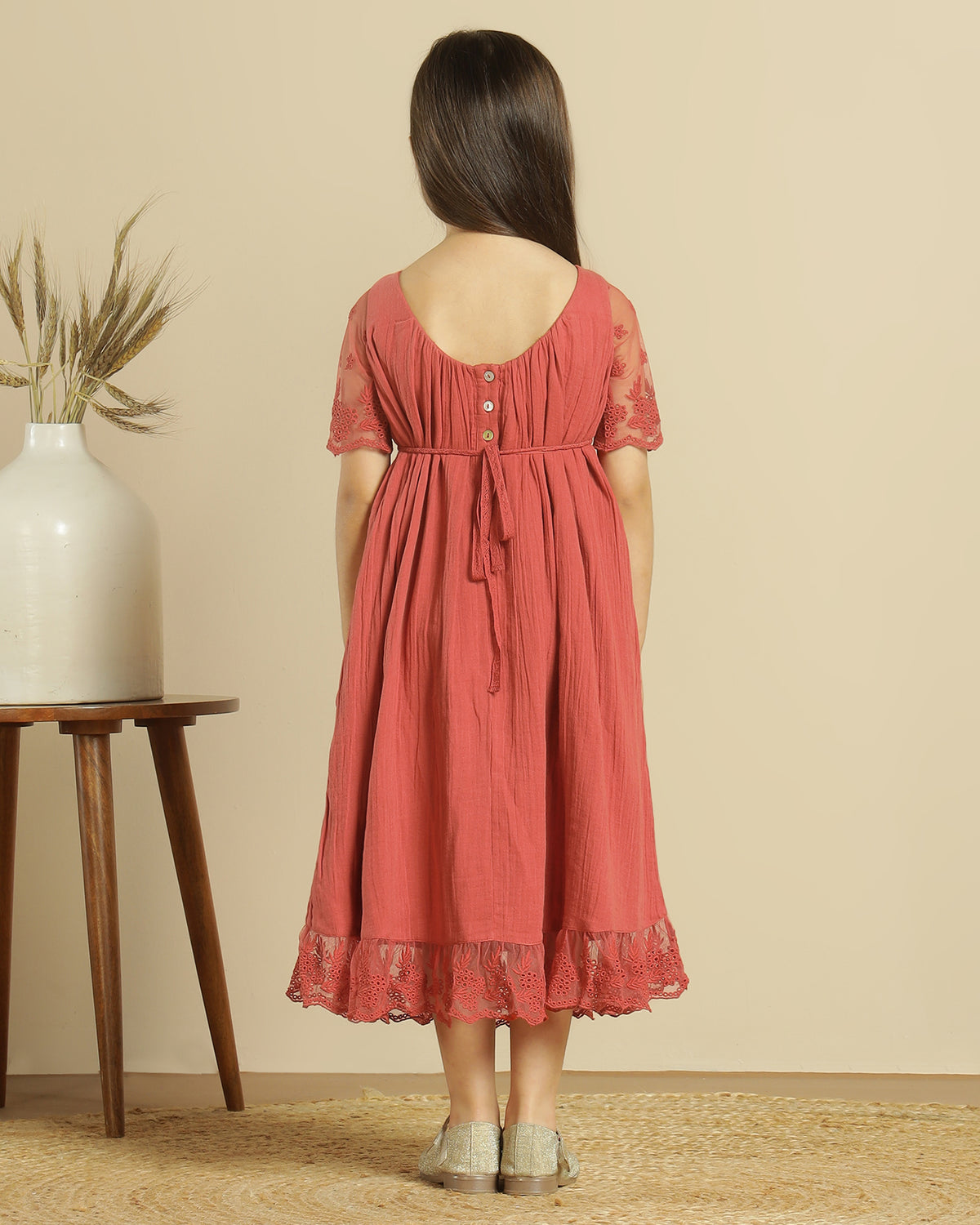 Red girls sleeveless lace fit and flare dress with layered skirt and floral detailing