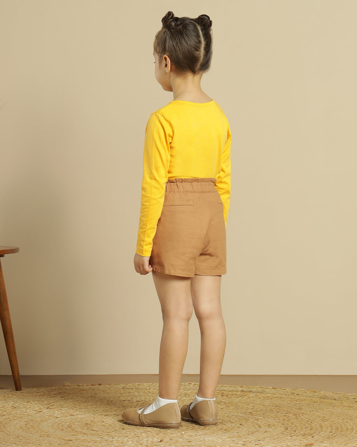 Brown girls casual shorts with elasticated waist and rolled hem