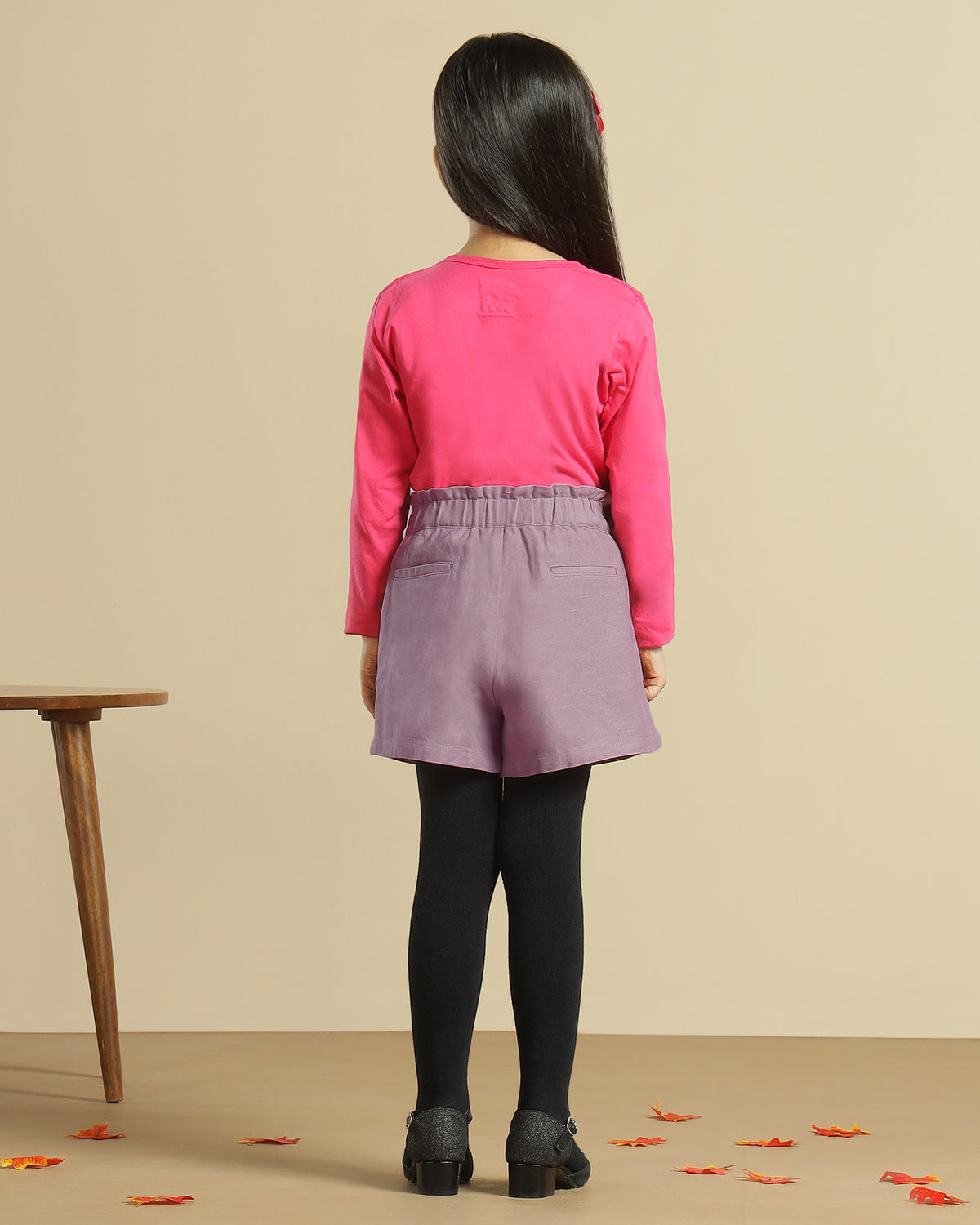 Mauve girls casual shorts with elasticated waist and rolled hem