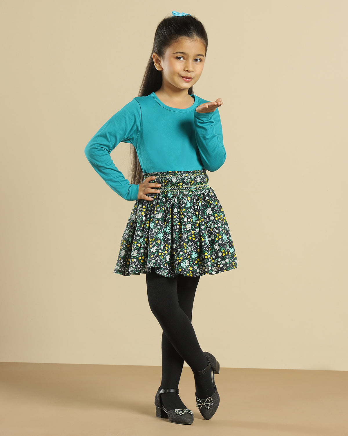 Black girls short sleeve top with green floral printed flared skirt