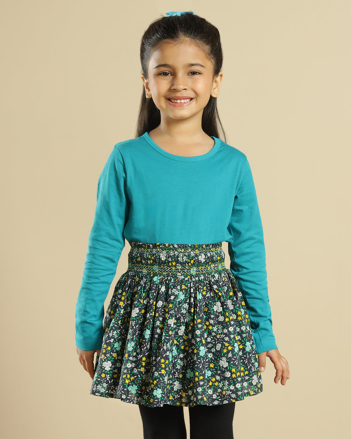 Black girls short sleeve top with green floral printed flared skirt