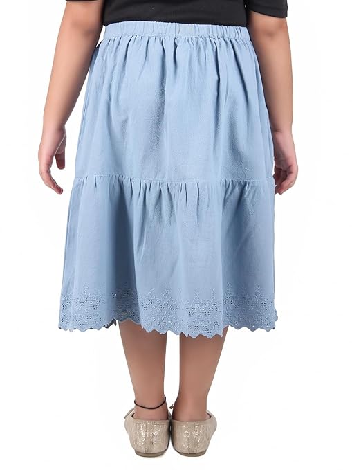 Black girls short sleeve top with blue flared skirt and gathered waist