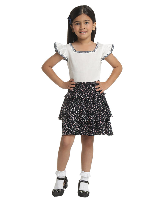 Black floral printed girls flared skirt with layered ruffle detailing and elasticated waist