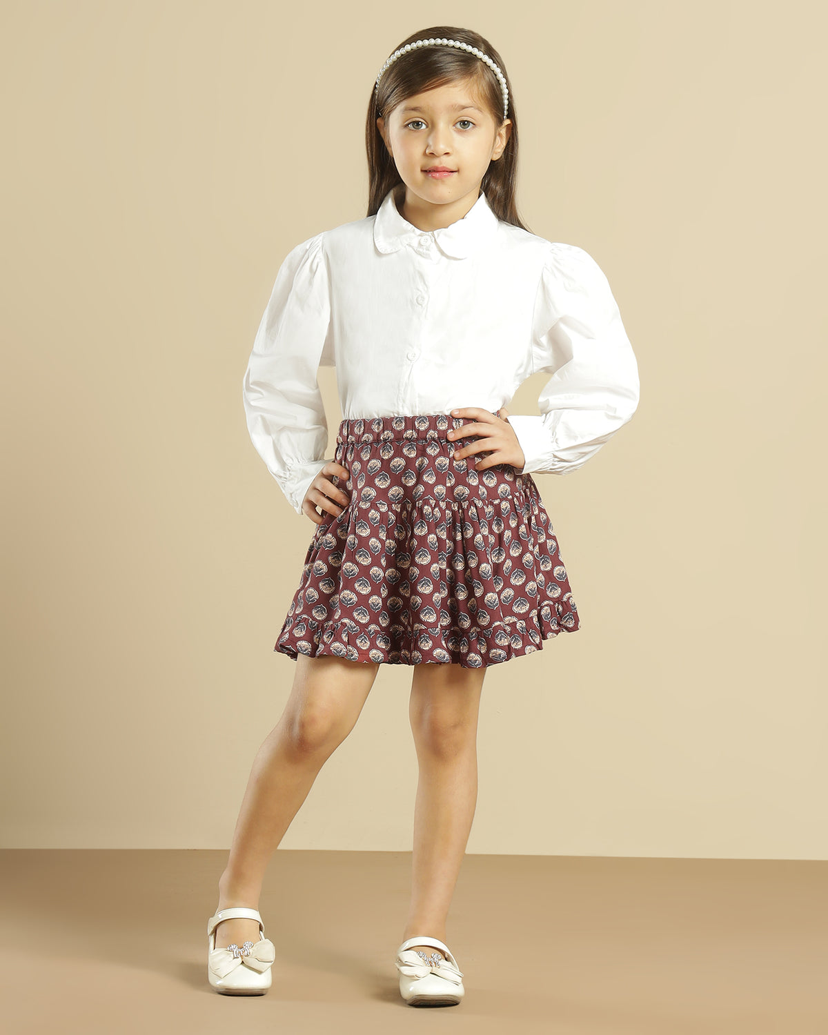 Maroon floral printed girls shorts with scalloped hem and contrast detailing